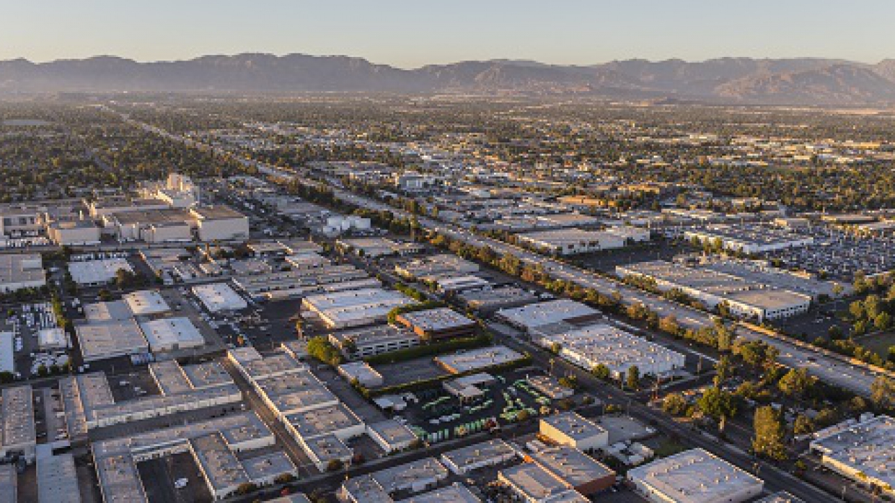 Late afternoon aerial above Van Nuys in the San Fernando Valley area of Los Angeles, California.