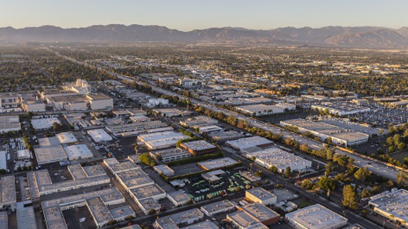 Late afternoon aerial above Van Nuys in the San Fernando Valley area of Los Angeles, California.