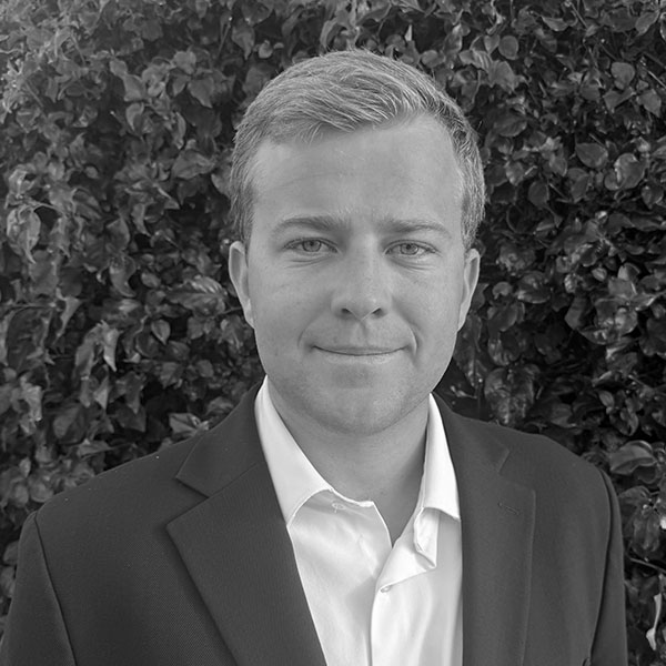 Black and white headshot_Eric Quiggle